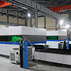 FL-L2060FHE-10000-Raycus Лазерный станок для резки листового металла с кабинетной защитой и сменным столом